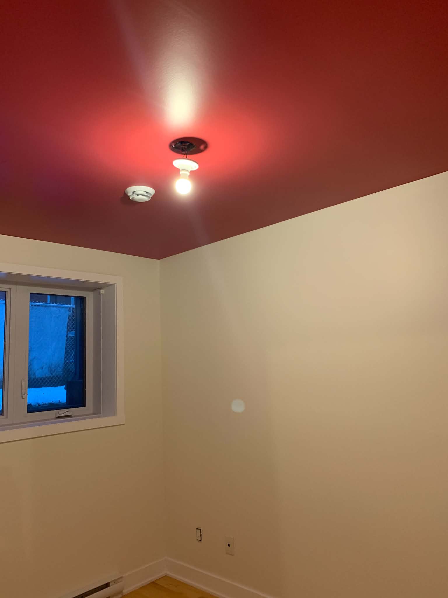 Bold red ceiling, white walls